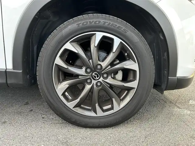 マツダ ＣＸ－５ 25S Lパッケージ 大阪府 2015(平27)年 5.3万km クリスタルホワイトパールマイカ ワンオーナー/革シート/前席パワーシート/前席シートヒーター/SDナビ フルセグTV CD DVD BT/バックカメラ/衝突被害軽減ブレーキ/レーダークルーズコントロール/レーンアシスト/ブラインドスポットモニタ/オートマチックハイビーム/LEDオートヘッドライト/フォグライト/スマートキー2個/バックソナー/ドラレコ/ETC/19インチアルミホイール/横滑り防止/ステアリングリモコン/W サイド カーテン エアバッグ/保証書 取説/禁煙車