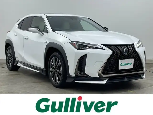 レクサス ＵＸ 250h Fスポーツ 岡山県 2020(令2)年 4.9万km ホワイトノーヴァガラスフレーク TRDフルエアロ/ムーンルーフ/白革シート/純正10.3インチメモリナビ/(CD/DVD/Carplay/USB/BT/フルセグTV)/レーダークルーズコントロール/衝突軽減ブレーキ/ビルトインETC2.0/シートヒーター/LEDヘッドライト/バックカメラ/ドライブレコーダー/ブラインドスポットモニター/ステアリングヒーター/D/N席パワーシート/電動リアゲート/前後コーナーセンサー/オートハイビーム/プッシュスタート/スマートキー/純正フロアマット/純正18インチアルミホール/新車保証書/取扱説明書/スペアキー×1/カードキー×１