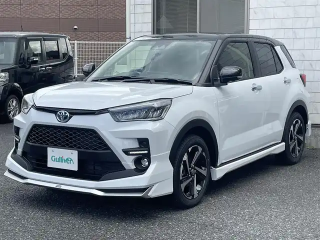 トヨタ ライズ Z 福岡県 2025(令7)年 0.1千km ブラックマイカメタリック/シャイニングホワイトパール ライズHV/登録時12km/ワンオーナー/モデリスタエアロ(フロント/サイド/リヤ)/2トーン(ブラックマイカメタリック/シャイニングホワイトパール)/純正9インチディスプレイオーディオ/　(AM/FM/Bluetooth/Android Auto/Apple CarPlay/フルセグTVキット)/パノラミックビューモニター/バック/フロント/サイドカメラ/スマートアシスト/・衝突警報/・衝突回避支援ブレーキ/・ブレーキ制御付誤発進抑制/・車線逸脱警報/・車線逸脱抑制制御/・路側逸脱警報/・ふらつき警報/・先行車発進お知らせ/・標識認識/・全車速追従機能/・レーンキープコントロール/ブラインドスポットモニター/コーナーセンサー/オートライト/リヤフォグランプ/純正17インチアルミホイール/革巻ステアリング/ステアリングスイッチ/シートヒーター(D/N)/USB端子×3/アクセサリーソケット/ISOFIX/スペアキー×1/保証書/取扱説明書/ナビ取扱説明書