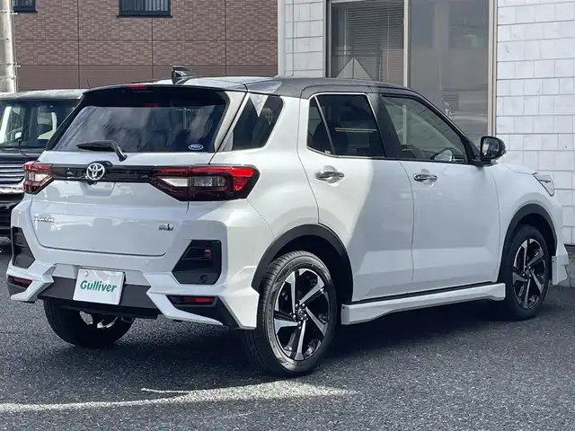 トヨタ ライズ Z 福岡県 2025(令7)年 0.1千km ブラックマイカメタリック/シャイニングホワイトパール ライズHV/登録時12km/ワンオーナー/モデリスタエアロ(フロント/サイド/リヤ)/2トーン(ブラックマイカメタリック/シャイニングホワイトパール)/純正9インチディスプレイオーディオ/　(AM/FM/Bluetooth/Android Auto/Apple CarPlay/フルセグTVキット)/パノラミックビューモニター/バック/フロント/サイドカメラ/スマートアシスト/・衝突警報/・衝突回避支援ブレーキ/・ブレーキ制御付誤発進抑制/・車線逸脱警報/・車線逸脱抑制制御/・路側逸脱警報/・ふらつき警報/・先行車発進お知らせ/・標識認識/・全車速追従機能/・レーンキープコントロール/ブラインドスポットモニター/コーナーセンサー/オートライト/リヤフォグランプ/純正17インチアルミホイール/革巻ステアリング/ステアリングスイッチ/シートヒーター(D/N)/USB端子×3/アクセサリーソケット/ISOFIX/スペアキー×1/保証書/取扱説明書/ナビ取扱説明書