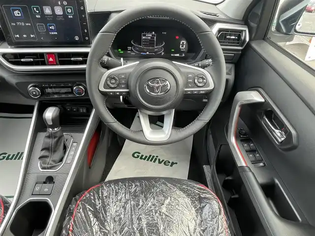 トヨタ ライズ Z 福岡県 2025(令7)年 0.1千km ブラックマイカメタリック/シャイニングホワイトパール ライズHV/登録時12km/ワンオーナー/モデリスタエアロ(フロント/サイド/リヤ)/2トーン(ブラックマイカメタリック/シャイニングホワイトパール)/純正9インチディスプレイオーディオ/　(AM/FM/Bluetooth/Android Auto/Apple CarPlay/フルセグTVキット)/パノラミックビューモニター/バック/フロント/サイドカメラ/スマートアシスト/・衝突警報/・衝突回避支援ブレーキ/・ブレーキ制御付誤発進抑制/・車線逸脱警報/・車線逸脱抑制制御/・路側逸脱警報/・ふらつき警報/・先行車発進お知らせ/・標識認識/・全車速追従機能/・レーンキープコントロール/ブラインドスポットモニター/コーナーセンサー/オートライト/リヤフォグランプ/純正17インチアルミホイール/革巻ステアリング/ステアリングスイッチ/シートヒーター(D/N)/USB端子×3/アクセサリーソケット/ISOFIX/スペアキー×1/保証書/取扱説明書/ナビ取扱説明書