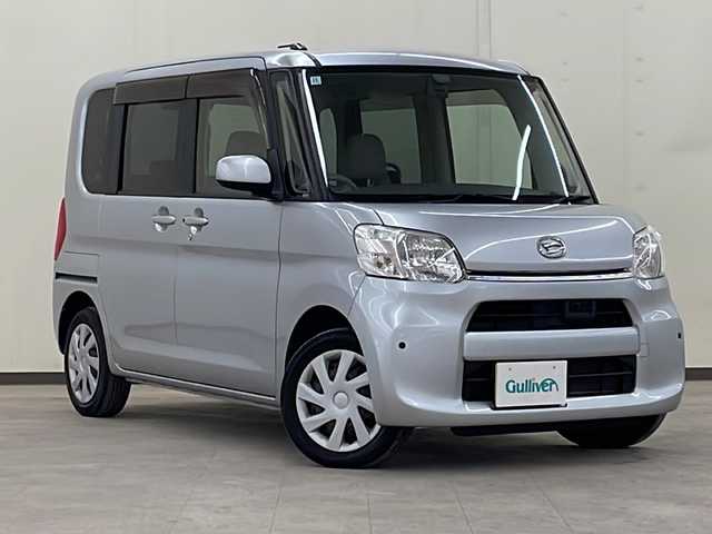 ダイハツ タント X SA 道央・札幌 2014(平26)年 9.5万km ブライトシルバーメタリック /4WD//純正ナビ：NMCK-W64D/（CD/SD/USB/ラジオ/ワンセグ）//片側パワースライドドア//横滑り防止装置//衝突被害軽減システム//アイドリングストップ//コーナーセンサー//プッシュスタート//オートライト//オートエアコン//電動格納ミラー//鉄ホイールスタッドレスタイヤ積込みあり