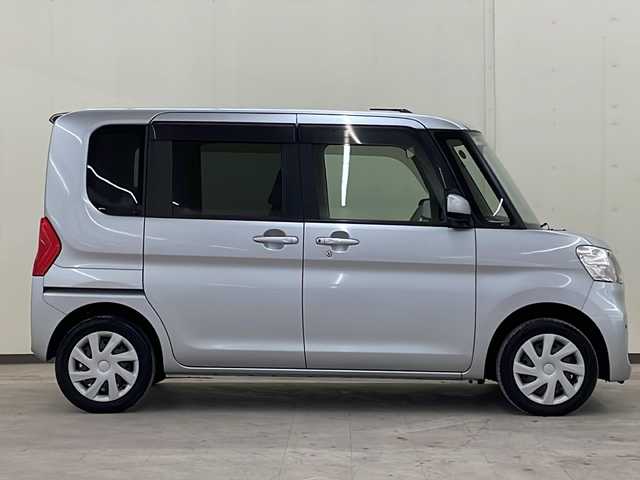 ダイハツ タント X SA 道央・札幌 2014(平26)年 9.5万km ブライトシルバーメタリック /4WD//純正ナビ：NMCK-W64D/（CD/SD/USB/ラジオ/ワンセグ）//片側パワースライドドア//横滑り防止装置//衝突被害軽減システム//アイドリングストップ//コーナーセンサー//プッシュスタート//オートライト//オートエアコン//電動格納ミラー//鉄ホイールスタッドレスタイヤ積込みあり