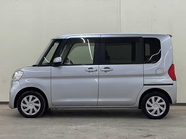 ダイハツ タント X SA 道央・札幌 2014(平26)年 9.5万km ブライトシルバーメタリック /4WD//純正ナビ：NMCK-W64D/（CD/SD/USB/ラジオ/ワンセグ）//片側パワースライドドア//横滑り防止装置//衝突被害軽減システム//アイドリングストップ//コーナーセンサー//プッシュスタート//オートライト//オートエアコン//電動格納ミラー//鉄ホイールスタッドレスタイヤ積込みあり