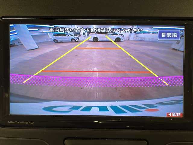 ダイハツ タント X SA 道央・札幌 2014(平26)年 9.5万km ブライトシルバーメタリック /4WD//純正ナビ：NMCK-W64D/（CD/SD/USB/ラジオ/ワンセグ）//片側パワースライドドア//横滑り防止装置//衝突被害軽減システム//アイドリングストップ//コーナーセンサー//プッシュスタート//オートライト//オートエアコン//電動格納ミラー//鉄ホイールスタッドレスタイヤ積込みあり