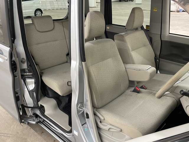 ダイハツ タント X SA 道央・札幌 2014(平26)年 9.5万km ブライトシルバーメタリック /4WD//純正ナビ：NMCK-W64D/（CD/SD/USB/ラジオ/ワンセグ）//片側パワースライドドア//横滑り防止装置//衝突被害軽減システム//アイドリングストップ//コーナーセンサー//プッシュスタート//オートライト//オートエアコン//電動格納ミラー//鉄ホイールスタッドレスタイヤ積込みあり