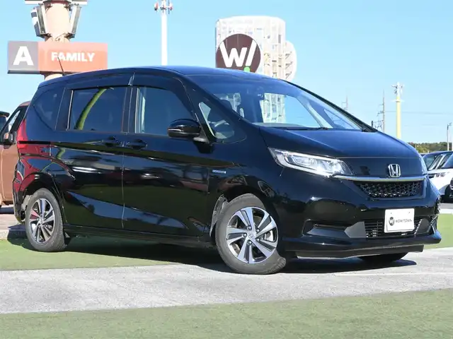 ホンダ フリード ハイブリット G ホンダセンシング 千葉県 2020(令2)年 5.6万km クリスタルブラックパール ホンダセンシング/・衝突軽減ブレーキ（CMBS）/・車線維持支援システム（LKAS）/・アダプティブクルーズコントロール（ACC）/・後方誤発進抑制機能/・誤発進抑制機能/両側パワースライドドア/ハーフレザーシート/前席シートヒーター/純正SDナビ/地デジTV/【DVD/CD再生機能　Bluetooth接続】/バックカメラ/ドライブレコーダー（前後撮影）/革巻きステアリング/ETC/LEDヘッドライト/ウインカーミラー/リアコーナーセンサー/純正15インチアルミホイル/Honda スマートキー
