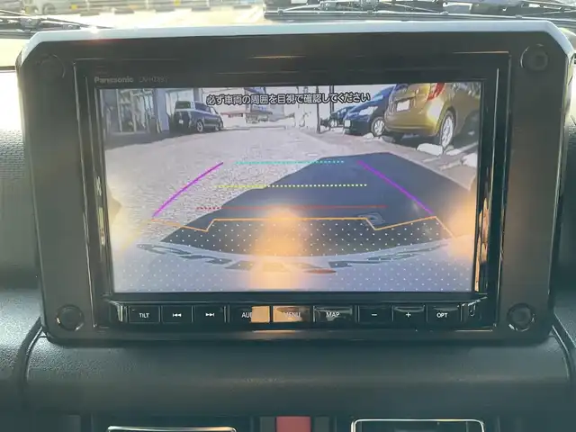 スズキ ジムニー シエラ JC 滋賀県 2024(令6)年 1.2万km ミディアムグレー ワンオーナー /車検令和9年5月まで/パートタイム4WD/純正LEDヘッドライト/・フォグランプ/RAYS16インチアルミホイール/（TEAM DAYTONA)スペア同ホイール/TOYO OPEN COUNTRY A/T スペア同タイヤ/純正フロントコーナーセンサー/純正8インチナビゲーション（CN-HZ895）/・フルセグTV/・FM/・CD/DVD/・Bluetooth/バックカメラ/純正ビルトインETC/純正前後ドライブレコーダー（ナビ連動）/前席シートヒーター/クルーズコントロール/純正フロアマット/スペアキー/取扱説明書/保証書/