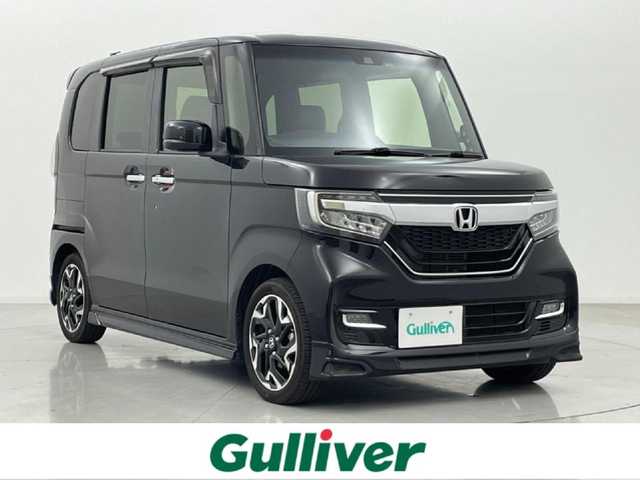 ホンダ Ｎ ＢＯＸ カスタム G L ターボ ホンダセンシング 熊本県 2019(令1)年 5.4万km クリスタルブラックパール 社外ナビフルセグTV BT CD AM FM/無限マフラー/両側パワースライドドア/バックカメラ/ビルトインETC/前席シートヒーター/無限エアロ（F・S・R）/ホンダセンシング/・衝突軽減ブレーキ/・アダブティブクルーズコントロール/・オートマチックハイビーム/・先行車発進お知らせ/・路外逸脱制御機能/・車線維持支援システム/・標識認識システム/横滑り防止/アイドリングストップ/ハーフレザーシート/純正フロアマット/純正AW/パドルシフト/ステアリングリモコン/オートライト/オートマチックハイビーム/LEDヘッドライト/スマートキー/プッシュスタート