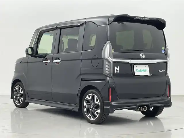 ホンダ Ｎ ＢＯＸ カスタム G L ターボ ホンダセンシング 熊本県 2019(令1)年 5.4万km クリスタルブラックパール 社外ナビフルセグTV BT CD AM FM/無限マフラー/両側パワースライドドア/バックカメラ/ビルトインETC/前席シートヒーター/無限エアロ（F・S・R）/ホンダセンシング/・衝突軽減ブレーキ/・アダブティブクルーズコントロール/・オートマチックハイビーム/・先行車発進お知らせ/・路外逸脱制御機能/・車線維持支援システム/・標識認識システム/横滑り防止/アイドリングストップ/ハーフレザーシート/純正フロアマット/純正AW/パドルシフト/ステアリングリモコン/オートライト/オートマチックハイビーム/LEDヘッドライト/スマートキー/プッシュスタート