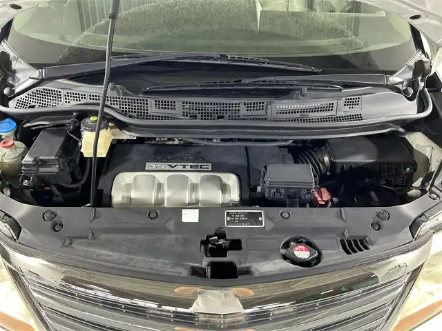 ホンダ エリシオン プレステージ SG HDDナビ 佐賀県 2007(平19)年 19万km ブルーイッシュホワイトパール 純正8型ナビ/（ＡＭ/ＦＭ/CD/DVD）/バックカメラ/クルーズコントロール/両側パワースライドドア/コーナーセンサー/ビルトインETC/HIDヘッドライト/盗難防止装置/レーダー探知機/スマートキー/スペアキー有/純正フロアマット/純正17インチアルミホイール	/ステアリングスイッチ/電動格納ミラー/ドアバイザー