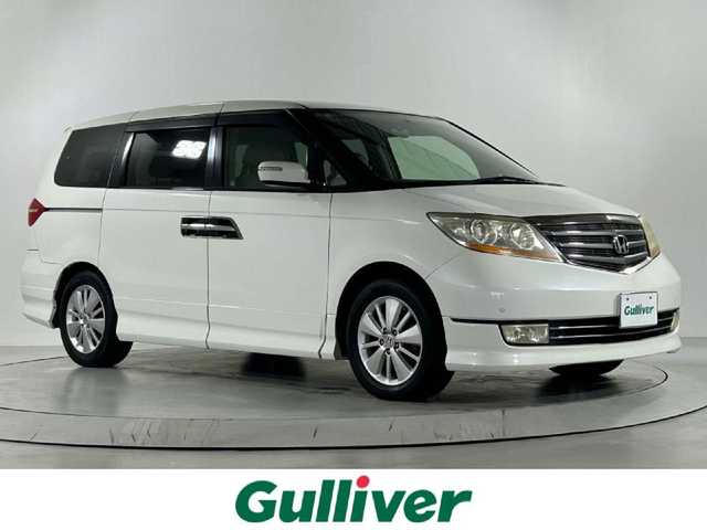 ホンダ エリシオン プレステージ SG HDDナビ 佐賀県 2007(平19)年 19万km ブルーイッシュホワイトパール 純正8型ナビ/（ＡＭ/ＦＭ/CD/DVD）/バックカメラ/クルーズコントロール/両側パワースライドドア/コーナーセンサー/ビルトインETC/HIDヘッドライト/盗難防止装置/レーダー探知機/スマートキー/スペアキー有/純正フロアマット/純正17インチアルミホイール	/ステアリングスイッチ/電動格納ミラー/ドアバイザー