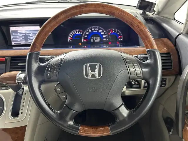 ホンダ エリシオン プレステージ SG HDDナビ 佐賀県 2007(平19)年 19万km ブルーイッシュホワイトパール 純正8型ナビ/（ＡＭ/ＦＭ/CD/DVD）/バックカメラ/クルーズコントロール/両側パワースライドドア/コーナーセンサー/ビルトインETC/HIDヘッドライト/盗難防止装置/レーダー探知機/スマートキー/スペアキー有/純正フロアマット/純正17インチアルミホイール	/ステアリングスイッチ/電動格納ミラー/ドアバイザー
