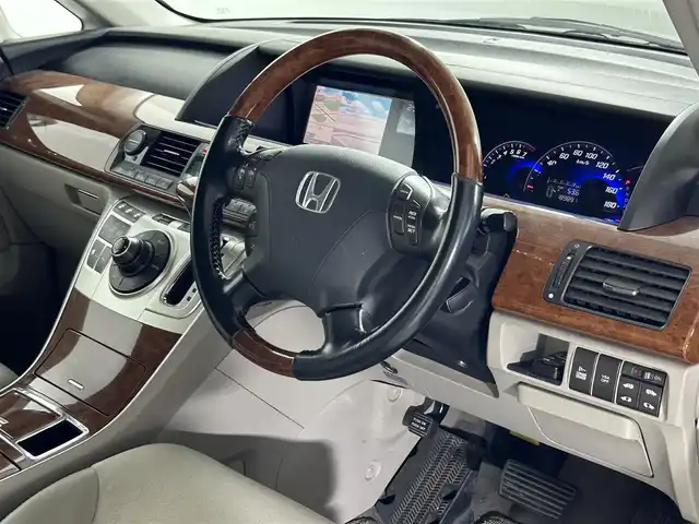 ホンダ エリシオン プレステージ SG HDDナビ 佐賀県 2007(平19)年 19万km ブルーイッシュホワイトパール 純正8型ナビ/（ＡＭ/ＦＭ/CD/DVD）/バックカメラ/クルーズコントロール/両側パワースライドドア/コーナーセンサー/ビルトインETC/HIDヘッドライト/盗難防止装置/レーダー探知機/スマートキー/スペアキー有/純正フロアマット/純正17インチアルミホイール	/ステアリングスイッチ/電動格納ミラー/ドアバイザー