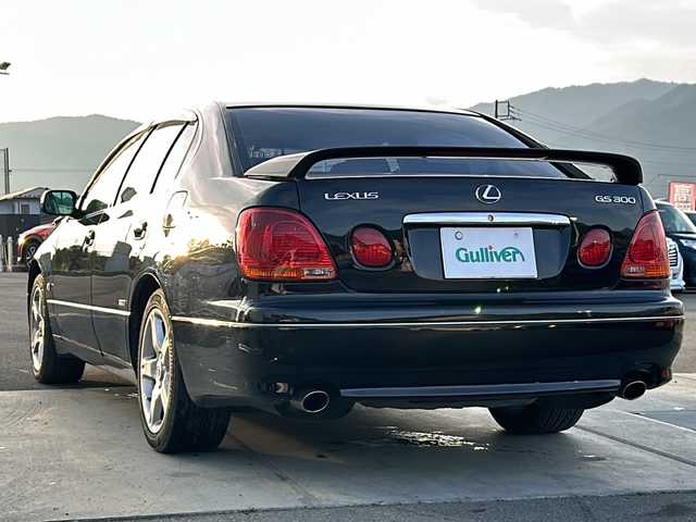 トヨタ アリスト S300 ベルテックエディション 山梨県 2002(平14)年 11.2万km ブラック 純正ナビ/クルーズコントロール/レザーシート/横滑り防止装置/ETC/HIDヘッドライト/オートライト/純正17インチAW/シートヒーター/リアウィング/パドルシフト/JBLサウンドシステム/プッシュスタート/スマートキー/純正フロアマット/スペアキー/取扱説明書/保証書
