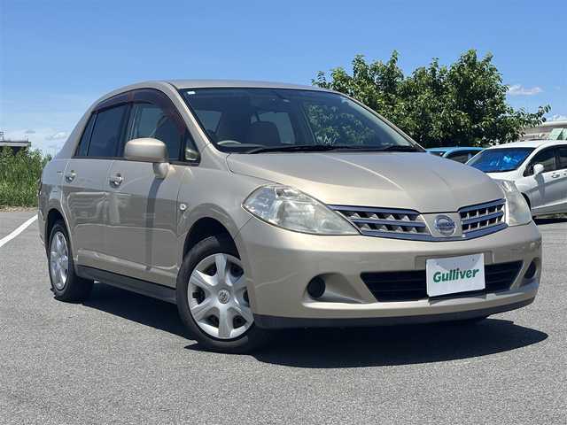 日産 ティーダ ラティオ 15M 奈良県 2009(平21)年 15.7万km シルキーベージュ 純正ナビ(ワンセグTV/CD/DVD/AM・FM)/バックカメラ/ETC/社外フロアマット/ドアバイザー/スペアキー