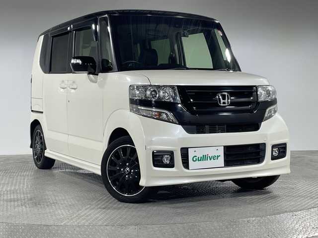ホンダ Ｎ ＢＯＸ 2トーン カスタム G ターボLパッケージ 神奈川県 2016(平28)年 6.3万km プレミアムホワイトパールⅡ CTBA/純正ナビ/・BT/フルセグTV/CD/DVD/SD/AM/FM/バックカメラ/両側電動スライドドア/ビルトインETC/前後ドライブレコーダー/ハーフレザーシート/シートリフター/スマートキー/プッシュスタートボタン/革巻きステアリング/ステアリングスイッチ/パドルシフト/クルーズコントロール/Autoライト/電動格納ミラー/ウィンカーミラー/HIDヘッドライト/フォグランプ/純正アルミホイール/純正フロアマット/純正ドアバイザー