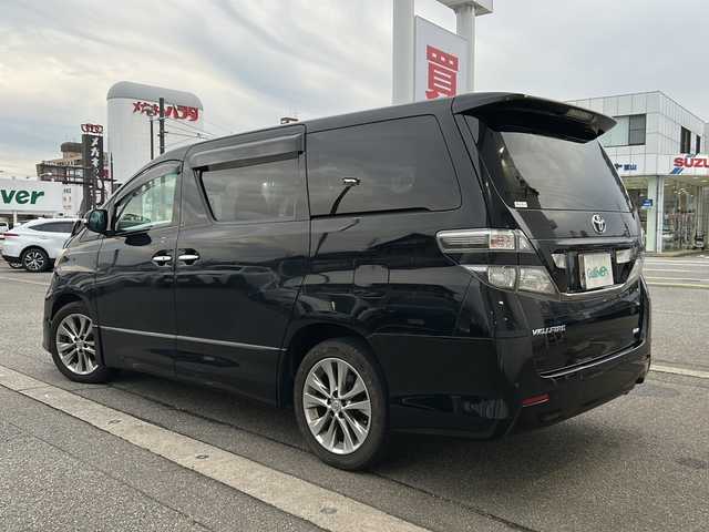 トヨタ ヴェルファイア 2．4Z プラチナセレクションⅡ 富山県 2011(平23)年 9.8万km ブラック ワンオーナー/４WD/両側パワースライドドア/スマートキー/純正メモリーナビ（NSZT-W60）/純正フリップダウンモニター/DVD/MSV/フルセグTV/バックカメラ/ビルトインETC/前後ドラレコ/純正１８インチAW/HIDヘッドライト/フォグ/クリアランスソナー/オットマンシート/電格ウィンカーミラー/木目・革巻きステアリング/ステアリングスイッチ/純正ドアバイザー/純正フロアマット/プッシュスタート/保証書・取説