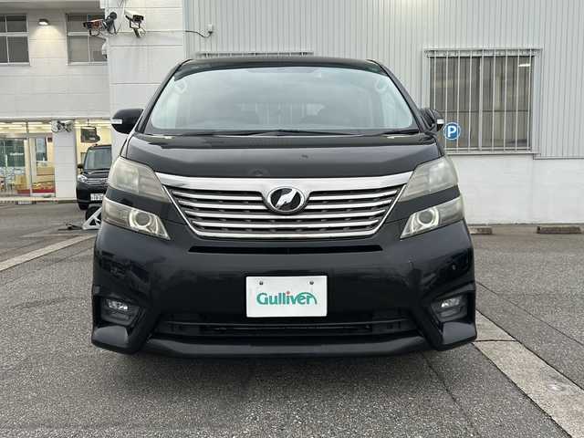 トヨタ ヴェルファイア 2．4Z プラチナセレクションⅡ 富山県 2011(平23)年 9.8万km ブラック ワンオーナー/４WD/両側パワースライドドア/スマートキー/純正メモリーナビ（NSZT-W60）/純正フリップダウンモニター/DVD/MSV/フルセグTV/バックカメラ/ビルトインETC/前後ドラレコ/純正１８インチAW/HIDヘッドライト/フォグ/クリアランスソナー/オットマンシート/電格ウィンカーミラー/木目・革巻きステアリング/ステアリングスイッチ/純正ドアバイザー/純正フロアマット/プッシュスタート/保証書・取説