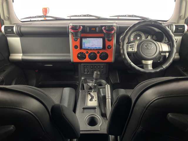 トヨタ ＦＪクルーザー 埼玉県 2014(平26)年 10.9万km オレンジ/ホワイト 社外ナビ/　（FM/AM/Bluetooth/iPod/DVD/CD）/フルセグテレビ/バックカメラ/ドライブレコーダー/フロアマット/コーナーセンサー/背面タイヤ/ETC