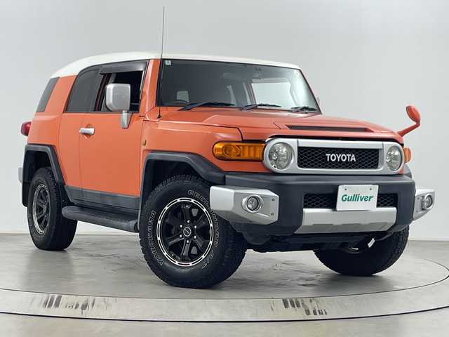 トヨタ ＦＪクルーザー 埼玉県 2014(平26)年 10.9万km オレンジ/ホワイト 社外ナビ/　（FM/AM/Bluetooth/iPod/DVD/CD）/フルセグテレビ/バックカメラ/ドライブレコーダー/フロアマット/コーナーセンサー/背面タイヤ/ETC