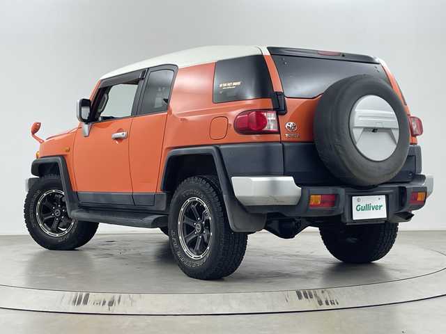 トヨタ ＦＪクルーザー 埼玉県 2014(平26)年 10.9万km オレンジ/ホワイト 社外ナビ/　（FM/AM/Bluetooth/iPod/DVD/CD）/フルセグテレビ/バックカメラ/ドライブレコーダー/フロアマット/コーナーセンサー/背面タイヤ/ETC