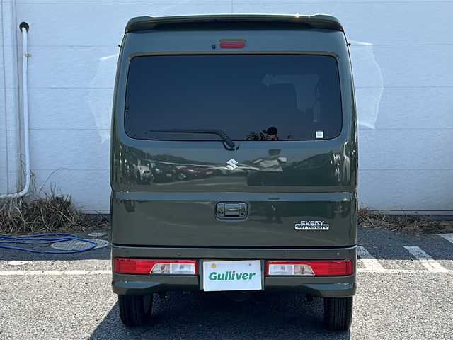 スズキ エブリィ ワゴン PZターボ スペシャル 千葉県 2024(令6)年 1.8万km クールカーキPM ナビ　ＴＶ　両側電動　ＥＴＣ　温シート　ＤＶＤ／ＣＤ　ワンオーナー　アイドリングストップ　ベッドキット　ＵＳＢ　ベンチシート　フォグランプ　電動オートステップ　コーナーセンサー　純正ＡＷ　オートライト/社外ナビ/ＴＶ/両側電動/ＥＴＣ/温シート/ＤＶＤ／ＣＤ/ワンオーナー/アイドリングストップ/ベッドキット/ＵＳＢ入力端子/ベンチシート/フォグランプ/社外サスペンション/電動オートステップ/コーナーセンサー/純正アルミホイール/純正フロアマット/ABS/横滑り防止装置/レーンキープアシスト/オートライト/キセノン/エアバックW/衝突被害軽減システム