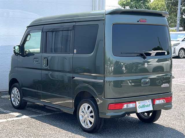 スズキ エブリィ ワゴン PZターボ スペシャル 千葉県 2024(令6)年 1.8万km クールカーキPM ナビ　ＴＶ　両側電動　ＥＴＣ　温シート　ＤＶＤ／ＣＤ　ワンオーナー　アイドリングストップ　ベッドキット　ＵＳＢ　ベンチシート　フォグランプ　電動オートステップ　コーナーセンサー　純正ＡＷ　オートライト/社外ナビ/ＴＶ/両側電動/ＥＴＣ/温シート/ＤＶＤ／ＣＤ/ワンオーナー/アイドリングストップ/ベッドキット/ＵＳＢ入力端子/ベンチシート/フォグランプ/社外サスペンション/電動オートステップ/コーナーセンサー/純正アルミホイール/純正フロアマット/ABS/横滑り防止装置/レーンキープアシスト/オートライト/キセノン/エアバックW/衝突被害軽減システム