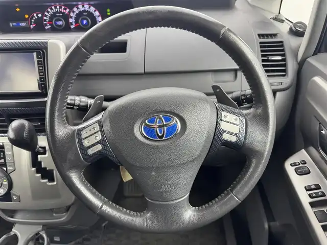 トヨタ ヴォクシー ZS 愛知県 2007(平19)年 19.3万km ダークバイオレットマイカメタリック 純正HDDナビ/　・CD/DVD/BT/ワンセグ/バックカメラ/ステアリングリモコン/パドルシフト/MTモード/ETC/3列シート/ウォークスルー/純正フロアマット/両側パワースライドドア/純正18インチアルミホイール/スマートキー