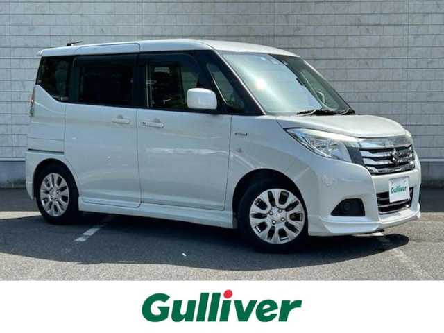 スズキ ソリオ 大阪府 2019(令1)年 2.1万km ピュアホワイトP KENWOODナビ/バックカメラ/ABS/横滑り防止装置/コーナーセンサー（前後）/レーンキープアシスト/盗難防止装置/衝突軽減システム/アイドリングストップ/クルーズコントロール（追従走行有）/オートライト/オートハイビーム/純正アルミホイール/片側パワースライドドア/ミュージックプレイヤー接続/CDチェンジャー/スマートキー