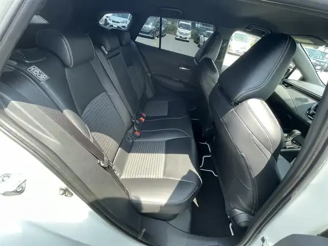 トヨタ カローラツーリング ハイブリッド ダブルバイビー 滋賀県 2020(令2)年 1.6万km ホワイトパールクリスタルシャイン 禁煙車/純正9インチナビ/・フルセグTV・Bluetooth・Miracast・AM・FM/モデリスタエアロ/バックカメラ/ビルトインETC/前後ドライブレコーダー/電動パーキングブレーキ/ブレーキホールド/レーダークルーズコントロール/ハーフレザーシート/ハーフレザーシート/横滑り防止機能/オートハイビーム/ブラインドスポットモニター/純正フロアマット/純正17インチアルミホイール