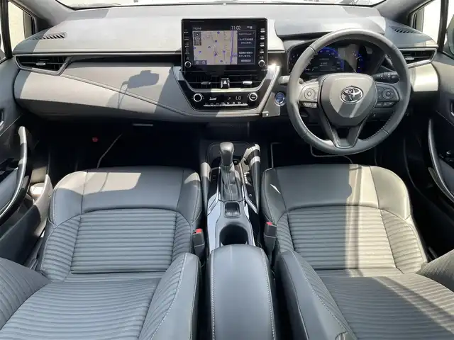 トヨタ カローラツーリング ハイブリッド ダブルバイビー 滋賀県 2020(令2)年 1.6万km ホワイトパールクリスタルシャイン 禁煙車/純正9インチナビ/・フルセグTV・Bluetooth・Miracast・AM・FM/モデリスタエアロ/バックカメラ/ビルトインETC/前後ドライブレコーダー/電動パーキングブレーキ/ブレーキホールド/レーダークルーズコントロール/ハーフレザーシート/ハーフレザーシート/横滑り防止機能/オートハイビーム/ブラインドスポットモニター/純正フロアマット/純正17インチアルミホイール