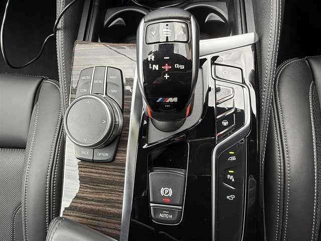 ＢＭＷ Ｍ５ 滋賀県 2019(令1)年 2.2万km マリナベイブルー アイゼンマンマフラー/TECH-M ECU制御/　・馬力約50UP/　・トルク約3割増/　・バブリングUP/黒フルレザーメリノインテリア/コンフォートP/スプリングスローダウン/Mキャリパー/パワーシート/メモリシート/シートヒーター/シートベンチレーション/シートマッサージ機能/Harman Kardon/全方位カメラ/純正ナビ/パドルシフト/純正フロアマット/純正20インチAW