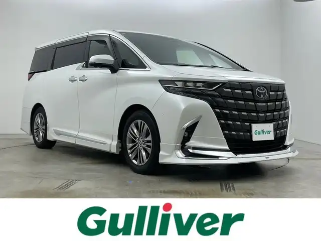 トヨタ アルファードハイブリット Z 岡山県 2024(令6)年 1万km プラチナホワイトパールマイカ モデリスタエアロ/左右独立ムーンルーフ/純正１４インチディスプレイオーディオ/【ナビ/Bluetooth/フルセグTV/Carplay/HDMI】/パノラミックビューモニター/ユニバーサルステップ/ＴＶキャンセラー/１００Ｖ電源/デジタルインナーミラー/ヘッドアップディスプレイ/社外ドライブレコーダー（全方位）/型番:ZDR-037/シートヒーター（1列目/2列目）/シートベンチレーション（1列目/2列目）/ステアリングヒーター/ＨＤＭＩ接続/ビルトインETC2.0/社外レーダー/LEDヘッドライト/保証書/取扱説明書/スマートキー×2