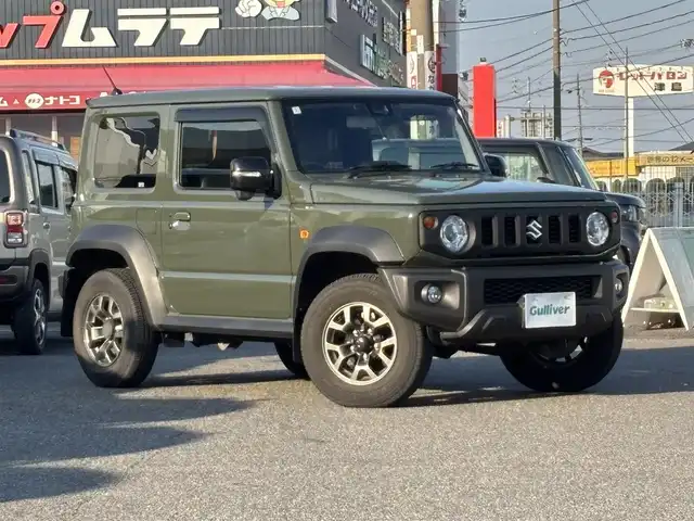 スズキ ジムニー シエラ JC 愛知県 2022(令4)年 1.8万km ジャングルグリーン /禁煙//ワンオーナー//BILSTEINダンパー//純正15AW//純正ナビ//CD/DVD/BT/フルセグ/MSV//バックカメラ//ETC//ドライブレコーダー//スロットルコントローラー//革調シートカバー//シートヒーター（前席）//衝突軽減ブレーキ//車線逸脱警報機能//クルーズコントロール//横滑り防止装置//盗難防止装置//LEDオートライト//フォグランプ//ハイビームアシスト//ヘッドライトウォッシャー//電動格納ウインカーミラー//アイドリングストップ//バニティミラー//本革巻きステアリング//ステアリングスイッチ//ドリンクホルダー//シフトイルミネーション//純正フロアマット//純正ドアバイザー//スペアスマートキー//新車時保証書//取扱説明書//ナビ取扱説明書//ディーラー記録簿　R4/R5/R6/R7//純正ダンパー4本積込//純正背面タイヤカバー付ホイール積込