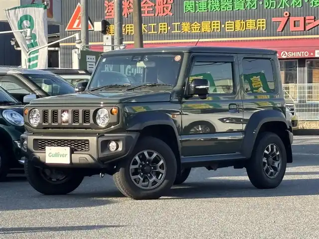 スズキ ジムニー シエラ JC 愛知県 2022(令4)年 1.8万km ジャングルグリーン /禁煙//ワンオーナー//BILSTEINダンパー//純正15AW//純正ナビ//CD/DVD/BT/フルセグ/MSV//バックカメラ//ETC//ドライブレコーダー//スロットルコントローラー//革調シートカバー//シートヒーター（前席）//衝突軽減ブレーキ//車線逸脱警報機能//クルーズコントロール//横滑り防止装置//盗難防止装置//LEDオートライト//フォグランプ//ハイビームアシスト//ヘッドライトウォッシャー//電動格納ウインカーミラー//アイドリングストップ//バニティミラー//本革巻きステアリング//ステアリングスイッチ//ドリンクホルダー//シフトイルミネーション//純正フロアマット//純正ドアバイザー//スペアスマートキー//新車時保証書//取扱説明書//ナビ取扱説明書//ディーラー記録簿　R4/R5/R6/R7//純正ダンパー4本積込//純正背面タイヤカバー付ホイール積込