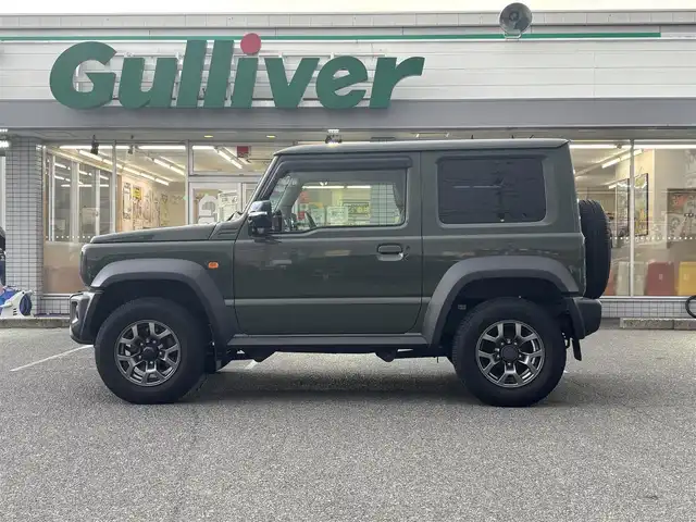 スズキ ジムニー シエラ JC 愛知県 2022(令4)年 1.8万km ジャングルグリーン /禁煙//ワンオーナー//BILSTEINダンパー//純正15AW//純正ナビ//CD/DVD/BT/フルセグ/MSV//バックカメラ//ETC//ドライブレコーダー//スロットルコントローラー//革調シートカバー//シートヒーター（前席）//衝突軽減ブレーキ//車線逸脱警報機能//クルーズコントロール//横滑り防止装置//盗難防止装置//LEDオートライト//フォグランプ//ハイビームアシスト//ヘッドライトウォッシャー//電動格納ウインカーミラー//アイドリングストップ//バニティミラー//本革巻きステアリング//ステアリングスイッチ//ドリンクホルダー//シフトイルミネーション//純正フロアマット//純正ドアバイザー//スペアスマートキー//新車時保証書//取扱説明書//ナビ取扱説明書//ディーラー記録簿　R4/R5/R6/R7//純正ダンパー4本積込//純正背面タイヤカバー付ホイール積込