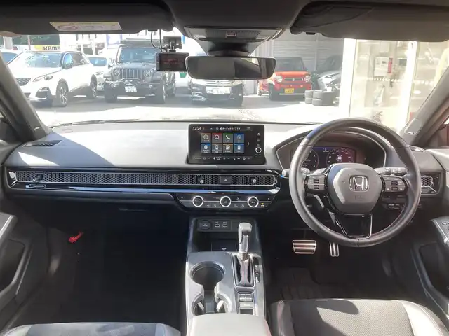 ホンダ シビック EX 長崎県 2022(令4)年 3.9万km クリスタルブラックパール ホンダセンシング/●衝突軽減ブレーキ（CMBS）/●近距離衝突軽減ブレーキ/●歩行者事故低減ステアリング/●路外逸脱抑制機能/●渋滞追従機能付アダプティブクルーズコントロール（ACC）/●車線維持支援システム（LKAS）/●誤発進抑制機能/●後方誤発進抑制機能/●先行車発進お知らせ機能/●標識認識機能/●アダプティブドライビングビーム（ADB）/●オートハイビーム/メーカーOPナビ/・Bluetooth接続/・フルセグTV/・スマートフォン連携/・USB入力/ドライブレコーダー【ZDR035】/ビルトインETC2.0/コーナーセンサー/ハーフレザーシート/・パワーシート/・シートヒーター/ステアリングスイッチ/パドルシフト/電子パーキング/ブレーキホールド機能/LEDオートヘッドライト/BOSEオーディオ/ワイヤレス充電/ISOFIX