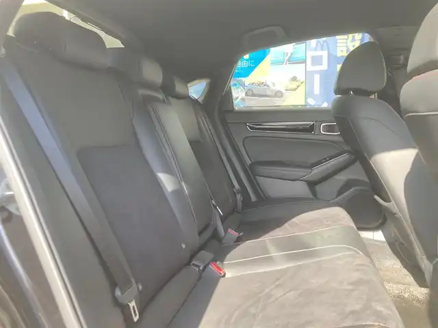 ホンダ シビック EX 長崎県 2022(令4)年 3.9万km クリスタルブラックパール ホンダセンシング/●衝突軽減ブレーキ（CMBS）/●近距離衝突軽減ブレーキ/●歩行者事故低減ステアリング/●路外逸脱抑制機能/●渋滞追従機能付アダプティブクルーズコントロール（ACC）/●車線維持支援システム（LKAS）/●誤発進抑制機能/●後方誤発進抑制機能/●先行車発進お知らせ機能/●標識認識機能/●アダプティブドライビングビーム（ADB）/●オートハイビーム/メーカーOPナビ/・Bluetooth接続/・フルセグTV/・スマートフォン連携/・USB入力/ドライブレコーダー【ZDR035】/ビルトインETC2.0/コーナーセンサー/ハーフレザーシート/・パワーシート/・シートヒーター/ステアリングスイッチ/パドルシフト/電子パーキング/ブレーキホールド機能/LEDオートヘッドライト/BOSEオーディオ/ワイヤレス充電/ISOFIX