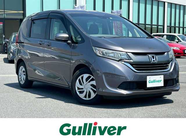 ホンダ フリード G ホンダセンシング 奈良県 2018(平30)年 6.4万km モダンスティールM 純正ナビ(VXM-184VFi)/(AM/FM/CD/DVD/BT/SD/フルセグTV）/バックカメラ/レーダークルーズコントロール/両側パワースライドドア/衝突軽減ブレーキ/横滑り防止装置/ビルトインETC/アイドリングストップ/ステアリングスイッチ/純正フロアマット/電格ウインカーミラー/ドアバイザー
