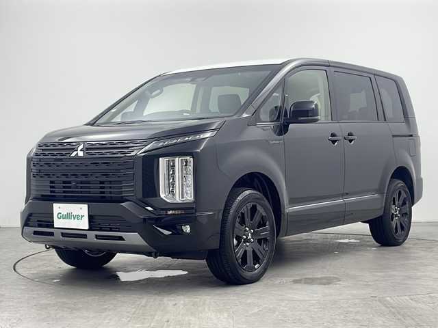 三菱 デリカＤ：５ シャモニー 三重県 2025(令7)年 0.1万km未満 黒Ⅱ 登録済未使用車　/D:5専用11型ナビゲーション(322300)/・フルセグTV/・HDMI/USB/・CD/DVD/・Bluetooth/・ミュージックサーバー/オリジナルナビ取付パッケージ＋リアモニター取付パッケージ/　(25300)/マルチアラウンドモニター/パートタイム4WD/ターボ/電子サイドブレーキ/ブレーキオートホールド/ステアリングスイッチ/ｅ－Ａｓｓｉｓｔ　/衝突軽減ブレーキ　/レーンキープアシスト　/オートハイビーム　/両側パワースライドドア　/電動リアゲート　/レーダークルーズコントロール　/ＬＥＤヘッドライト/フォグランプ/ステップレス/パドルシフト/ステアリングヒーター/ハーフレザーシート/D席パワーシート /AC100V100W電源
