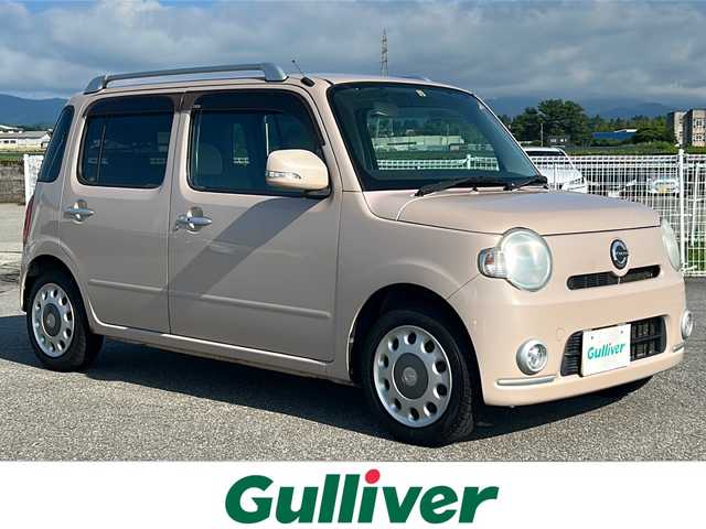 ダイハツ ミラ ココア プラスX 富山県 2012(平24)年 8.7万km ムースピンクパール ４ＷＤ/ディーラーナビ/ＣＤ・ＤＶＤ/ＢｌｕｅＴｏｏｔｈ/社外ＡＷ/ＡＡＣ/プッシュスタート/社外フロアマット/スマートキー/盗難防止装置/Wエアバッグ/ＥＴＣ/保証書/取扱説明書/記録簿