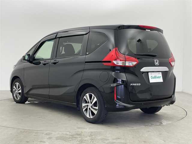 ホンダ フリード G ホンダセンシング 富山県 2022(令4)年 3万km クリスタルブラックパール 社外ディスプレイオーディオ（AM/FM/CD/BT/USB）/バックカメラ/ETC/両側パワースライドドア/シートヒーター/衝突被害軽減システム/レーダークルーズコントロール/レーンキープアシスト/横滑り防止装置/アイドリングストップ/純正アルミホイール/純正フロアマット/オートLEDライト/ステアリングスイッチ/スマートキー/スペアキー