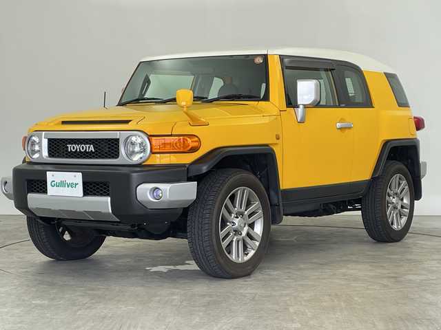 トヨタ ＦＪクルーザー カラーパッケージ 三重県 2011(平23)年 7.5万km イエロー/ホワイト 純正ナビ　/【ＣＤ／ＤＶＤ／Ｂｌｕｅｔｏｏｔｈ】　/地デジ対応ＴＶ　/バックカメラ　/センターデフロック/フォグランプ/ヘッドライトレベライザー　/ＥＴＣ　/クルーズコントロール　/２０インチ純正アルミホイール　/Ｒコーナーセンサー