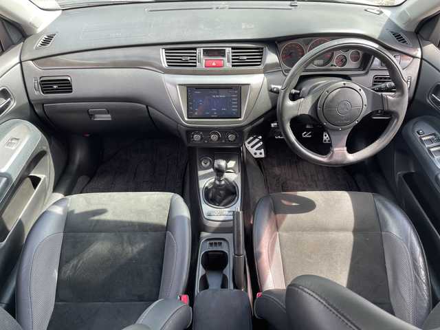 三菱 ランサー ワゴン GT エボリューション 三重県 2005(平17)年 7.7万km シルキーホワイト 登録時76996km/禁煙車/ＫＥＸＷＯＯＤ７インチディスプレイオーディオ/・Ｂｌｕｅｔｏｏｔｈ・ｃａｒｐｌａｙ・ＣＤ・ＵＳＢ/バックカメラ/ＲＥＣＡＲＯシート/黒ハーフレザーシート/ＭＯＭＯステ/ＡＵＴＯライト/ＥＴＣ/電動格納ミラー/AAC/リモコンキー