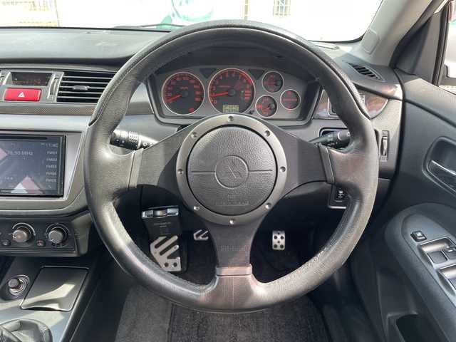 三菱 ランサー ワゴン GT エボリューション 三重県 2005(平17)年 7.7万km シルキーホワイト 登録時76996km/禁煙車/ＫＥＸＷＯＯＤ７インチディスプレイオーディオ/・Ｂｌｕｅｔｏｏｔｈ・ｃａｒｐｌａｙ・ＣＤ・ＵＳＢ/バックカメラ/ＲＥＣＡＲＯシート/黒ハーフレザーシート/ＭＯＭＯステ/ＡＵＴＯライト/ＥＴＣ/電動格納ミラー/AAC/リモコンキー