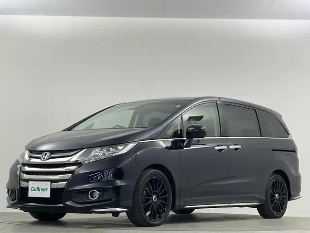 ホンダ オデッセイ アブソルート 埼玉県 2013(平25)年 6.8万km プレミアムヴィーナスブラックP 純正ナビ　１０型後席モニター　両側　ETC バックカメラ　クルーズコントロール　Ｂｌｕｅｔｏｏｔｈ　フルセグＴＶ　純正フロアマット　オットマン　フルフラット　ＬＥＤヘッドライト　衝突軽減被害