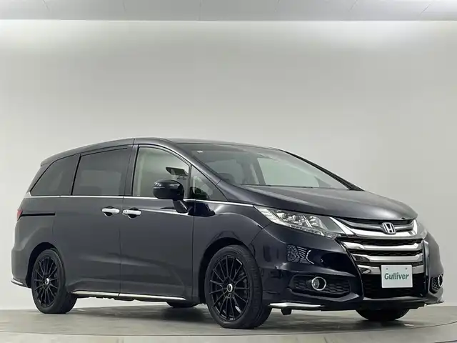 ホンダ オデッセイ アブソルート 埼玉県 2013(平25)年 6.8万km プレミアムヴィーナスブラックP 純正ナビ　１０型後席モニター　両側　ETC バックカメラ　クルーズコントロール　Ｂｌｕｅｔｏｏｔｈ　フルセグＴＶ　純正フロアマット　オットマン　フルフラット　ＬＥＤヘッドライト　衝突軽減被害