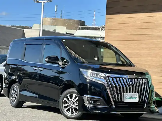 トヨタ エスクァイア Gi 香川県 2019(平31)年 5.3万km ブラック ワンオーナー/10インチT-Connectナビ/フルセグ/CD/DVD/Bluetooth/純正フリップダウンモニター/TRDフロントスポイラー/両側パワースライドドア/セーフティセンス/プリクラッシュ/オートハイビーム/レーンキープ/純正15インチアルミ/LEDヘッドライト/クリアランスソナー/スマートキー/ビルトインETC