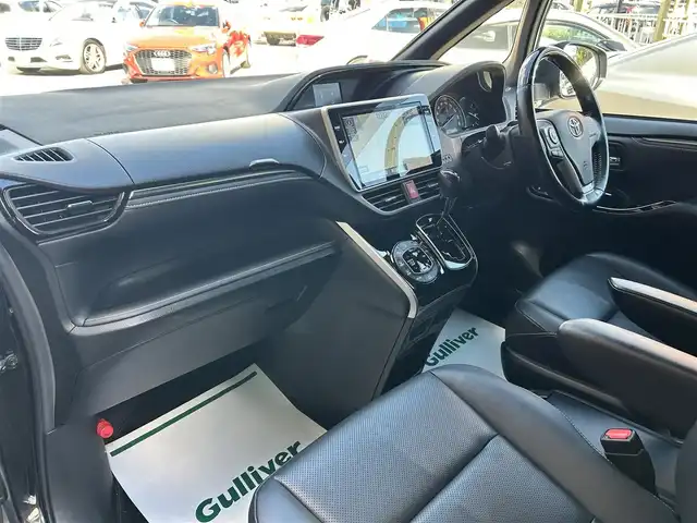 トヨタ エスクァイア Gi 香川県 2019(平31)年 5.3万km ブラック ワンオーナー/10インチT-Connectナビ/フルセグ/CD/DVD/Bluetooth/純正フリップダウンモニター/TRDフロントスポイラー/両側パワースライドドア/セーフティセンス/プリクラッシュ/オートハイビーム/レーンキープ/純正15インチアルミ/LEDヘッドライト/クリアランスソナー/スマートキー/ビルトインETC